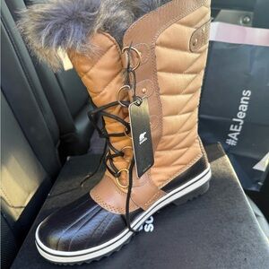 Sorel Tan and Black Winter Boots